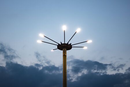 glowing lantern on the background of the sky with cloudsの写真素材