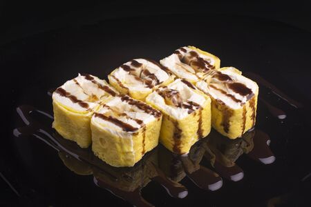 sweet rolls with cream and fruitの写真素材