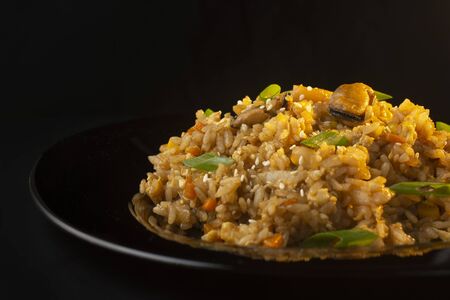 chinese rice with mussels and squidの写真素材