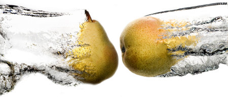 Pears strike into the waterの写真素材