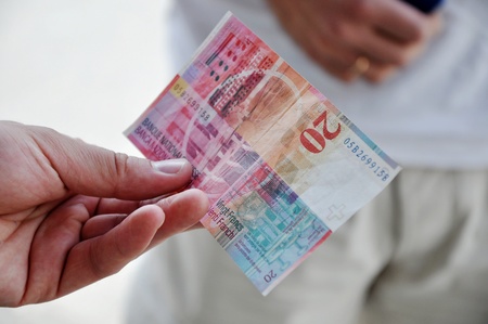 Twenty Switzerland francs bank note in the hand.の写真素材