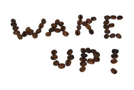 Phrase wake up written with coffee beans isolated on whiteの写真素材