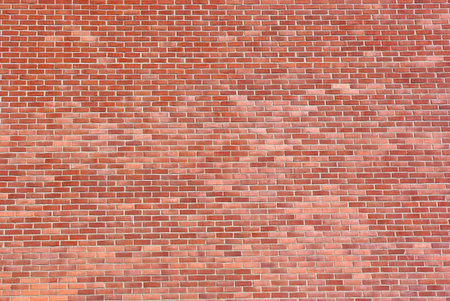 Adged brown brick wall
