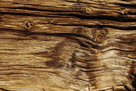 Old wooden wethered board surface as backgroundの写真素材