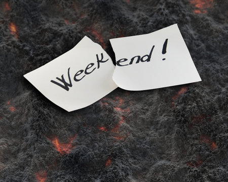 Weekend - Hand writing text on a piece of paper on lawa background