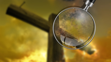 Wooden cross against the skyin fireの写真素材