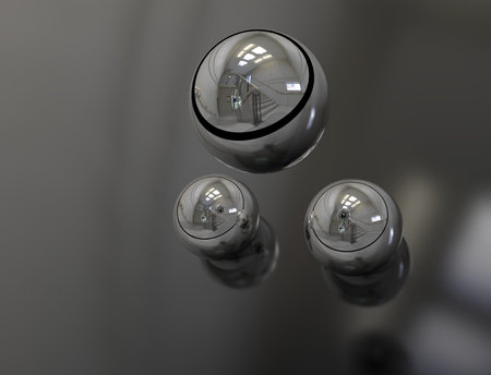 3D digital render of metallic chrome spheres isolated over white background