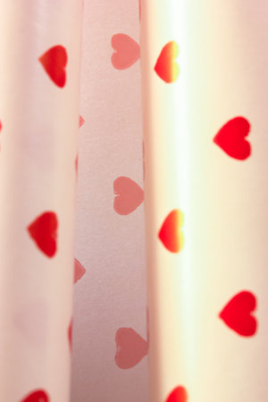 Background for Valentine's Day or all lovers day, red little hearts on white background
