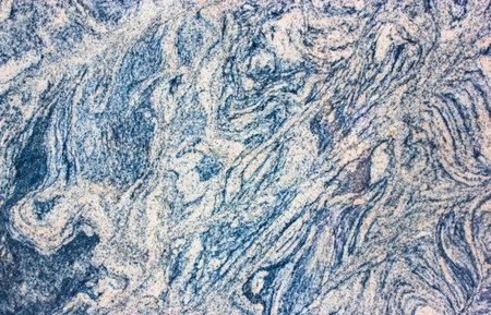 Marble granite. Natural decorative stone with gray and blue streaks. Natural granite background and...