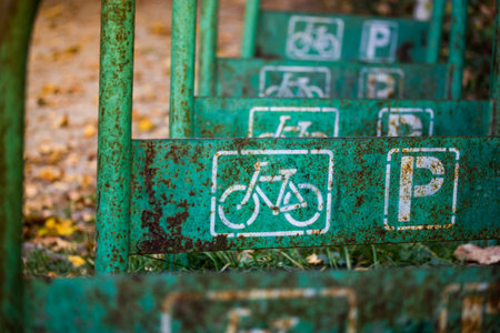 Retro bicycle parking structure. Eco transport vehicle storage. Vintage green parking area. Old...