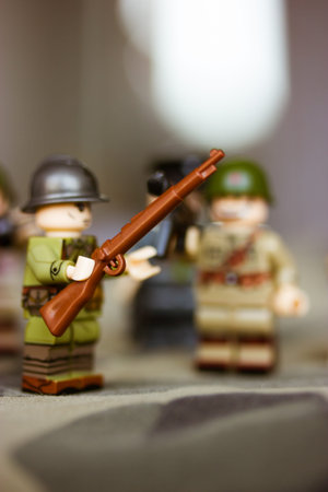 Kyiv, Ukraine. March 9, 2022. LEGO soldiers from Second World War. Toy soldier in camouflage uniform...