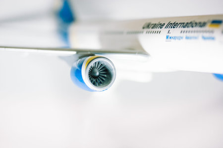 Kyiv, Ukraine. 1 May 2022 A nose of a white toy airplane of the Ukraine International company,...