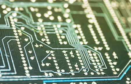 Green yellow motherboard background and texture. Production of circuit board, electronic computer components. Software engineering, hardware technology. Technological digital backdrop wallpaper. chip.の写真素材
