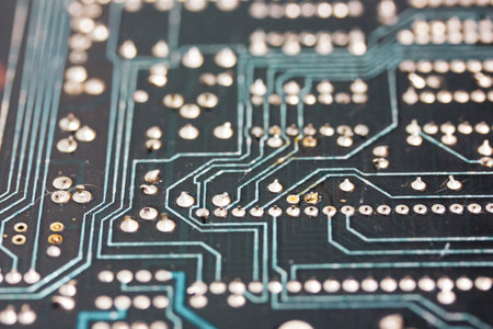 Kyiv Ukraine 1 May 2021 Green motherboard background Production of circuit board, electronic computer components Software engineering, hardware technology Technological digital backdrop Chip wallpaperの写真素材
