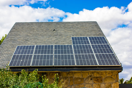 Roof of a private house with solar panels, modules for generating electricity. autonomous solar...