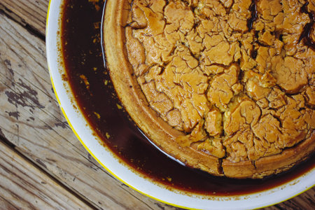 Flan is a dessert dish made with eggs, sugar, milk, topped with caramel. Spanish cuisine dessert. A...