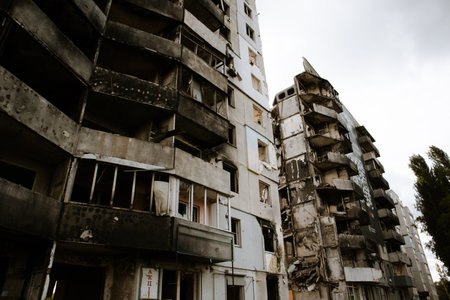 Borodyanka, Ukraine September 30, 2023 A brick wall destroyed by bombs and rockets fired by Russian soldiers at apartment buildings. War in Ukraine. Political conflict. Destroyed lives. Social crisis.のeditorial素材