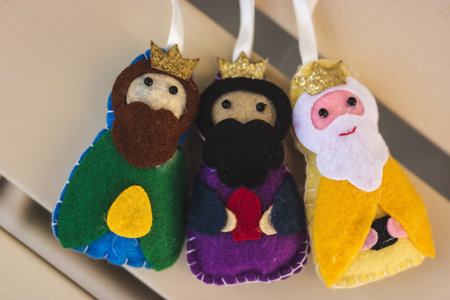 Christmas composition of three wise men Melchior, Caspar, Balthazar on yellow background. Epiphany...