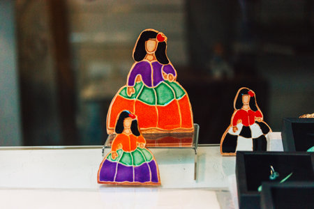 Madrid, Spain. 7 May 2023 Las Meninas by Velazquez in bouffant dresses. Three decorative multicolored dolls. Glass decor. Traditional Spanish souvenirのeditorial素材
