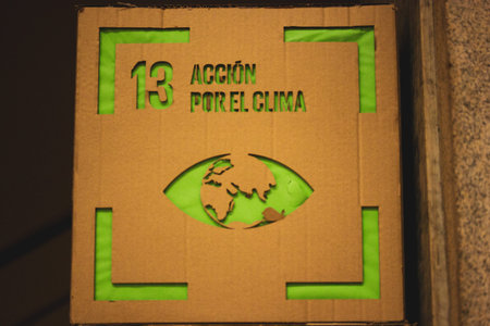 Green paper cut earth planet with nature environment inside. Modern 3d papercut illustration concept...
