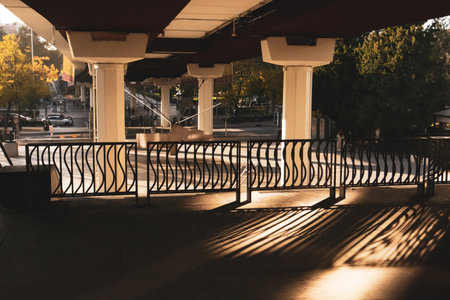 Madrid, Spain. 1 October 2023 Under a bridge Contrasting diagonal shadows on concrete floor, sunlight. Shadow and sunshine. Urban architecture detailsのeditorial素材