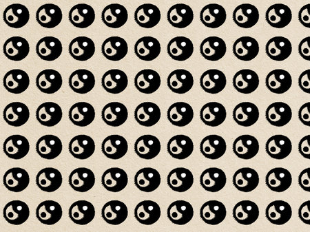 Yin Yang Pattern. A grid pattern with many Yin Yang symbols is displayed against a textured beige background. The repeated design creates a sense of balance. Mindfulness and wellbeing concept.の写真素材