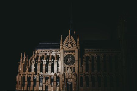 KYIV, Ukraine 1 November 2025 Intricate architectural LEGO model of a cathedral against a dark background.のeditorial素材