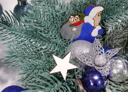 Christmas decor figurine and stars on the tree.の写真素材