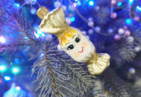 Christmas decoration cute toy candy on the christmas treeの写真素材