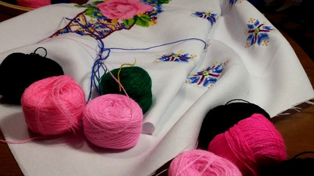 Tangle of threads, hanging with a cross, multicolored threadsの写真素材