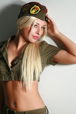 Beautiful woman in military clothesの写真素材