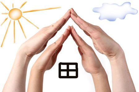 Hands show family house concept isolated on white backgroundの写真素材