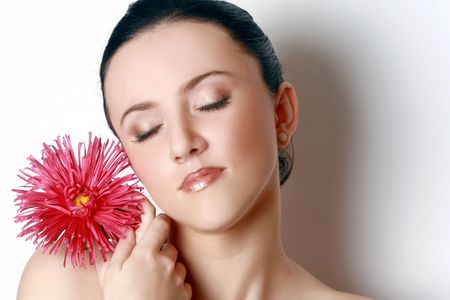 Gorgeous brunette with red asterの写真素材