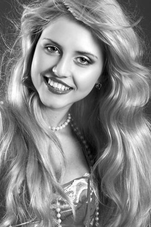 Monochrome portrait of a cheerful glamour young womanの写真素材