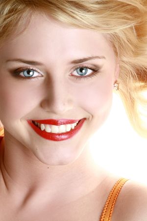 Close-up portrait of a satisfied young girlの写真素材