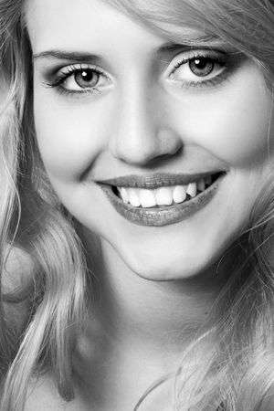 Close-up Monochrome portrait of a satisfied young girlの写真素材