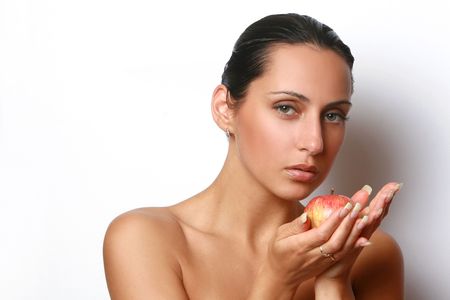 Young woman with red appleの写真素材