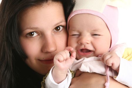 Close-up portrait of a cute baby girl with motherの写真素材
