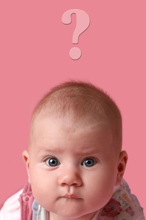 Baby girl with surprised face on pink background
の写真素材