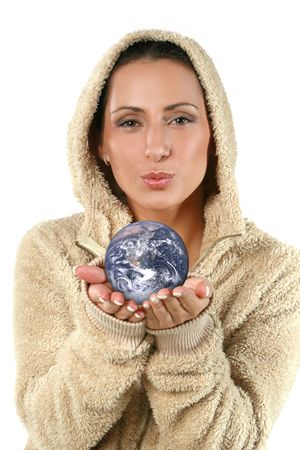 Pretty woman holding a globe in her handsの写真素材