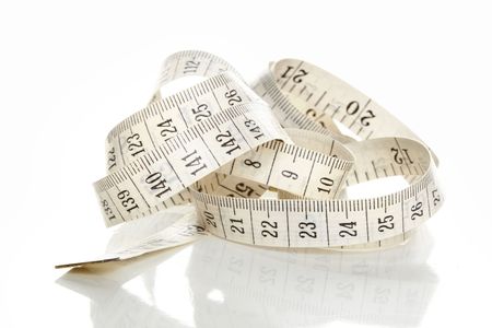 Curled white measuring tapeの写真素材