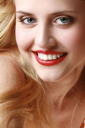 Close-up portrait of cheerful young womanの写真素材