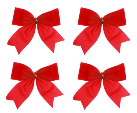 Four xmas red bow, isolated on a white backgroundの写真素材