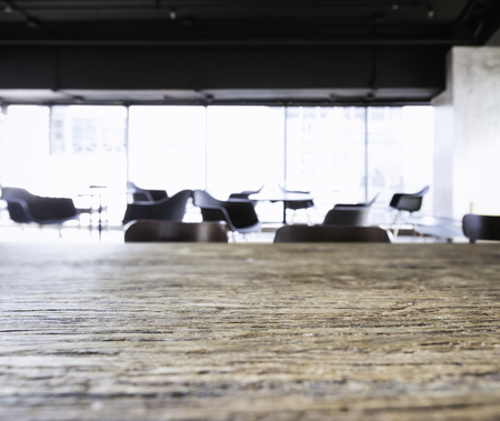 Table top with Blurred Office space Lobby Interior Backgroundの写真素材
