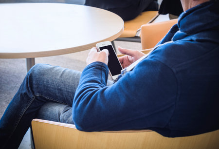 Man with Smart phone sit in cafe Lifestyle Social media network