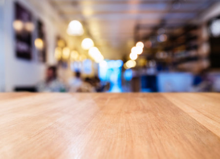 Table top with Blurred Bar restaurant cafe interior background