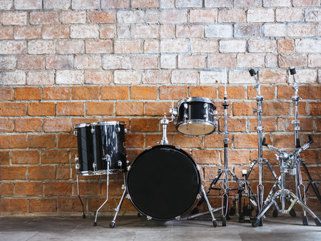 Drum Music instrument Sound equipment on Brick wall backgroundの写真素材