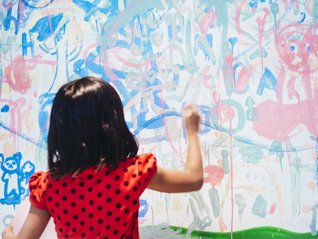 Girl painting on colorful Canvas Art Creative activityの写真素材