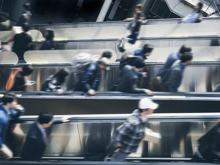 Crowd Blurred people on escalator Train Station Travel business conceptの写真素材