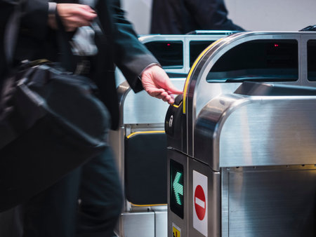 People insert ticket to Ticket Entrance at Train station
